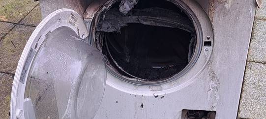 Waschmaschine in Flammen